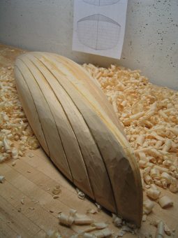 model boat in the carving process